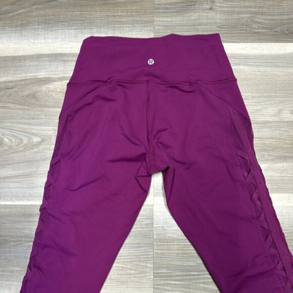 Lululemon purple leggings with lace up mesh sides, size 8 - Picture 5 of 7
